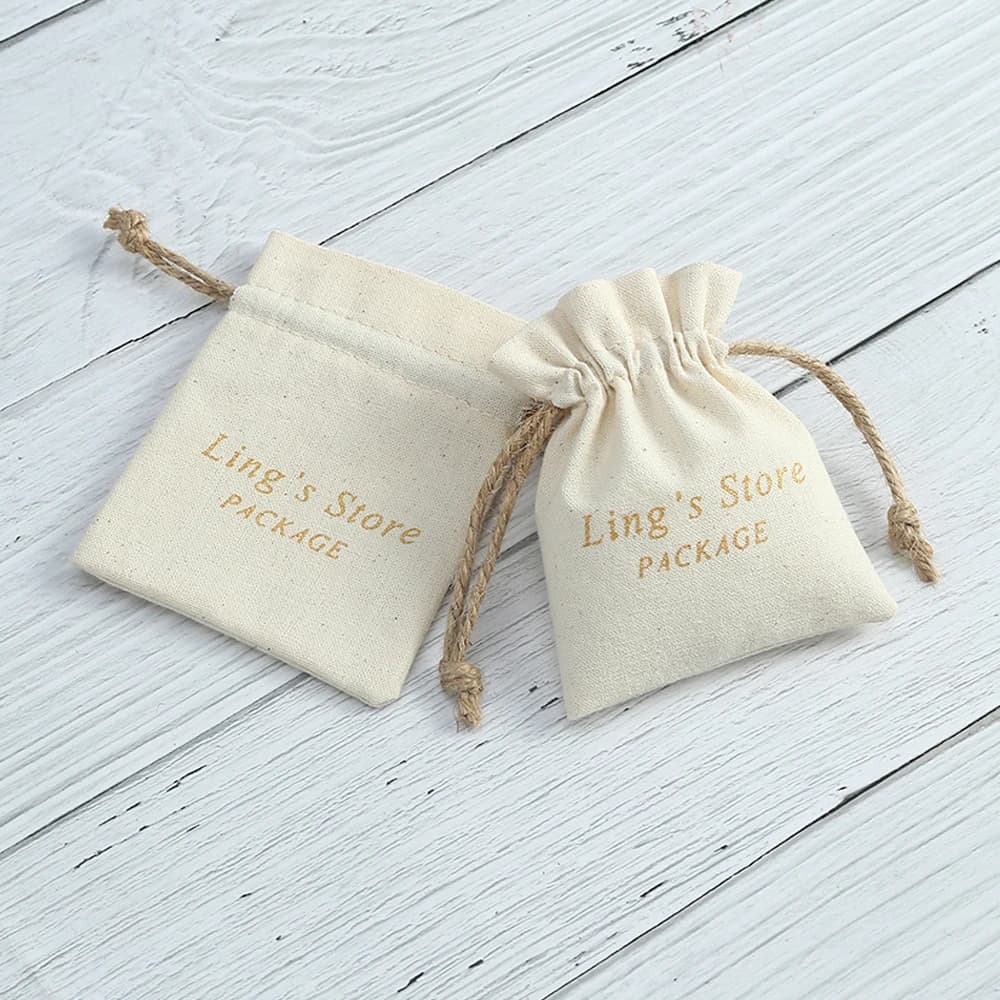 Sac à bijoux en toile de coton avec Logo personnalisé, 50 pièces, sacs cadeaux en toile naturelle pour collier, boucle d'oreille, bague,