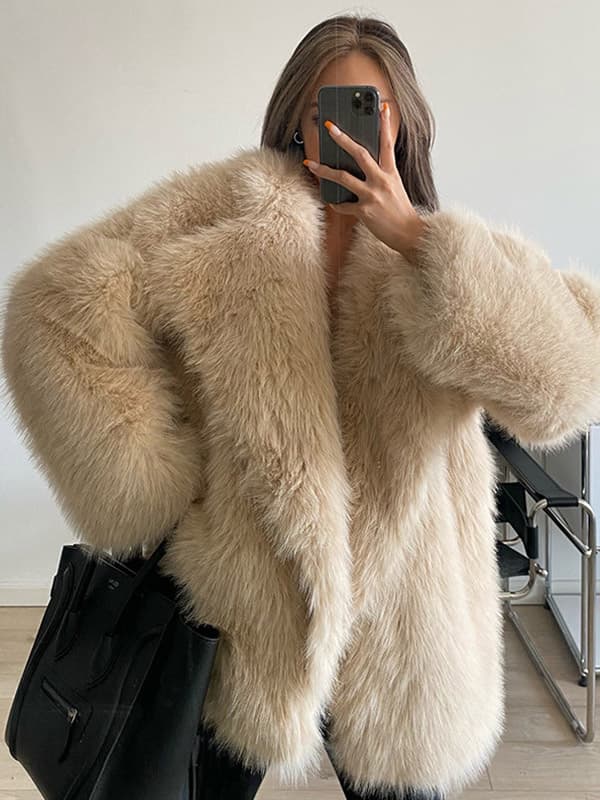 Manteau en fausse fourrure à revers cranté veste d\\'hiver écologique de couleur unie pour femmes 2026